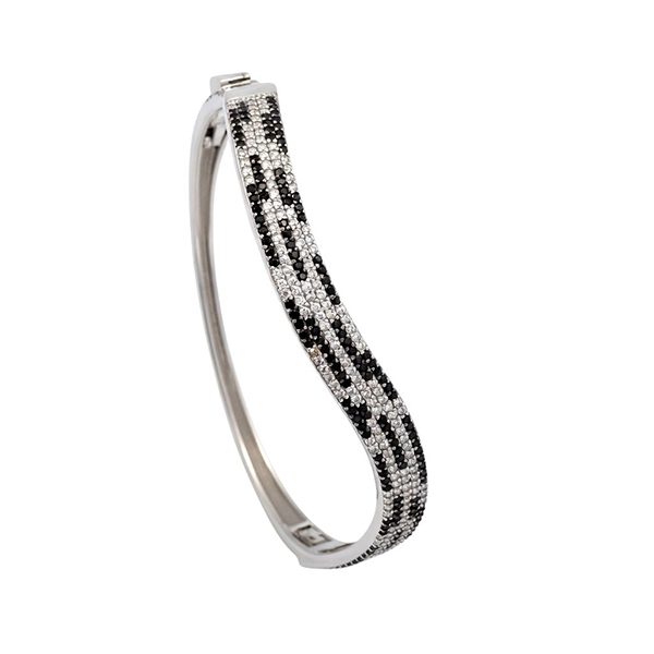 7504DW18 Armreif, Silber, Zirkoniasteine weiß, schwarz, geschwungen, rhodiniert